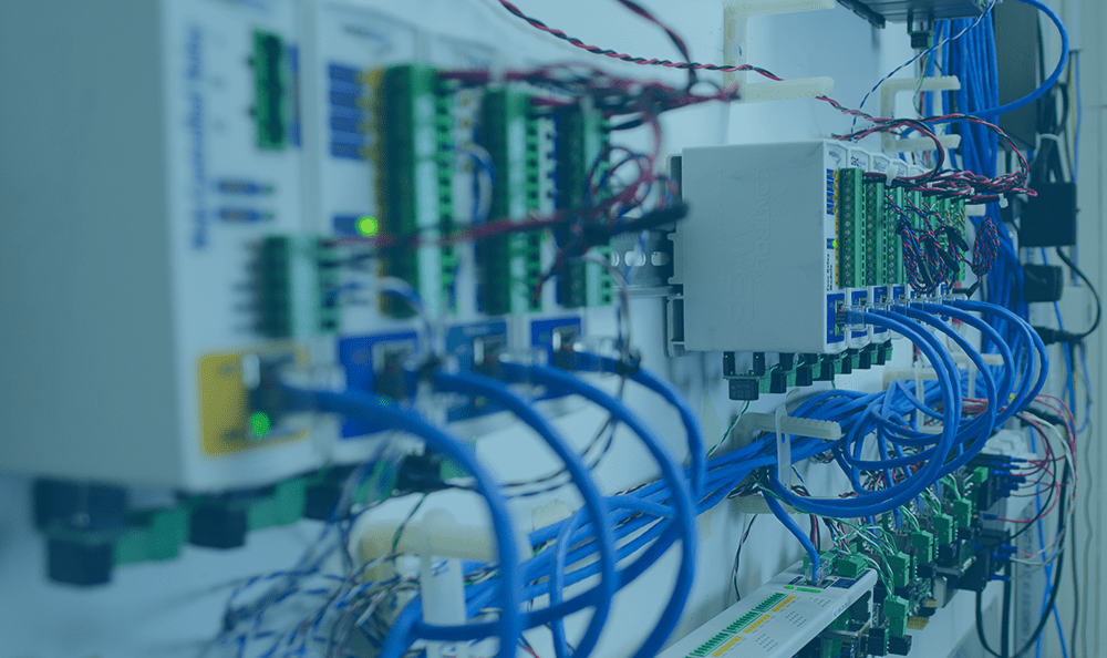 Multiple ControlByWeb IO controllers that are mounted on DIN rails